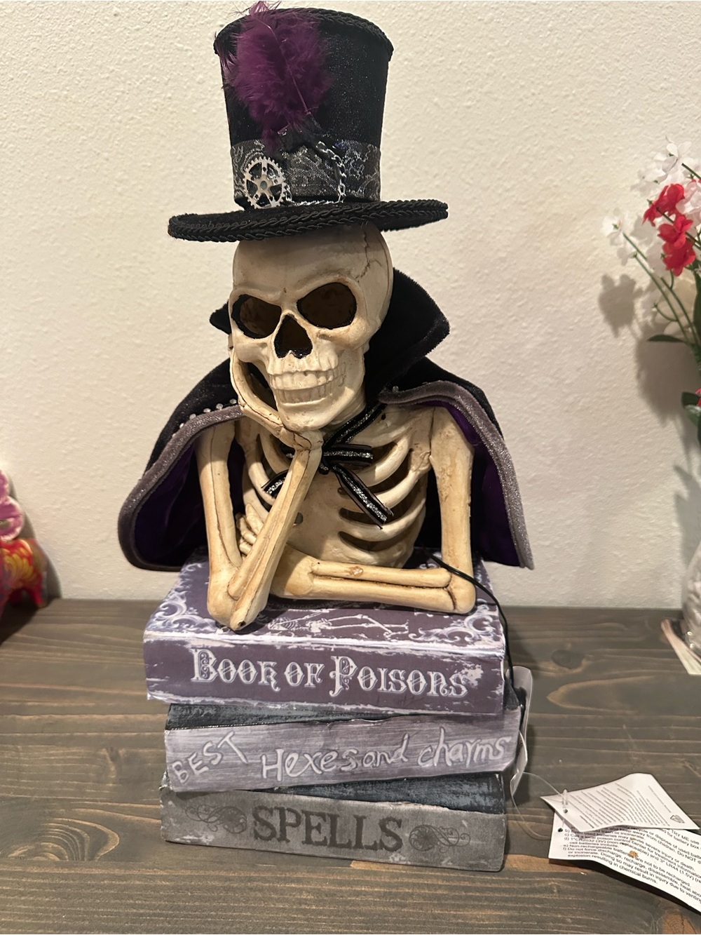 Purple Gothic Skeleton Book Stack Accent